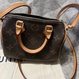 Louis Vuitton Mini Brown Monogram Bag

Speedy Nano!